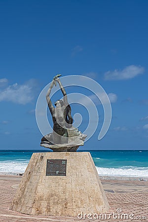 La Triguena sculpture at promenade on Isla Mujeres near Cancun city, vertical Editorial Stock Photo