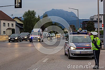 LAAKIRCHEN, AUSTRIA SEPTEMBER 24, 2015: Police stands guard at a Editorial Stock Photo