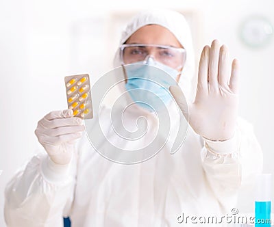 Lab assistant in drug synthesis concept Stock Photo