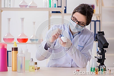 The lab chemist checking beauty and make-up products Stock Photo