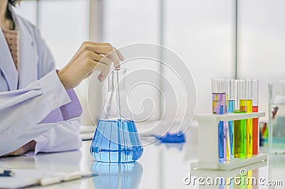 Lab Testing Products By chemist, women, and chemistry experiments, liquid colors for everyday chemicals To develop safe for consu Stock Photo