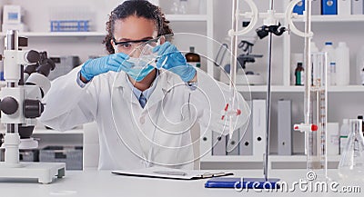 Lab worker, woman scientist and chemical pour of a employee with science work. Laboratory, medical test and chemistry Stock Photo