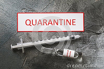 Label with inscription, syringe and ampoule with COVID-19 coronavirus vaccine. Concept of a quarantine Stock Photo