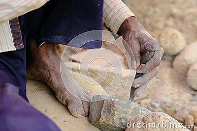 Labor hand working on field, close up Stock Photo