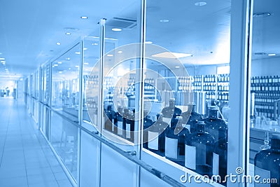 A view to a chemical laboratory through glass windows Stock Photo