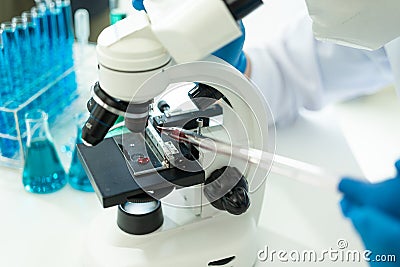 Laboratory concept: Close-up of chemicals in a laboratory, a biochemist is conducting experiments in a controlled environment Stock Photo