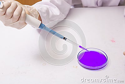 Laboratory droper of liquid Stock Photo