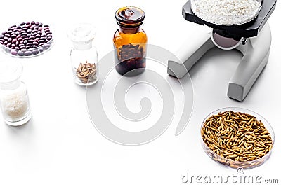 Laboratory for food analysis. Rice under the microscope on white background copyspace Stock Photo