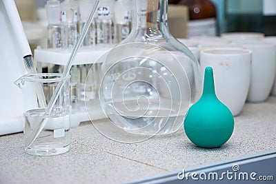 Laboratory test bench with various glass containers. Biological and chemical research concept Stock Photo