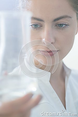 Laboratory worker holding test tube Stock Photo