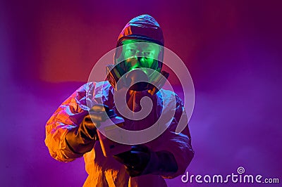A laboratory worker presents a container with a dangerous substance Stock Photo