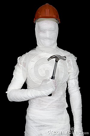 Laborer in bandages with helmet and hammer Stock Photo
