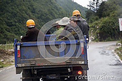 Laborers going to work Editorial Stock Photo