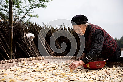 A laborious and virtuous grandma Editorial Stock Photo