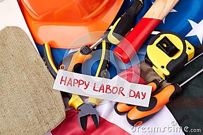 Labour Day card on flag. Stock Photo
