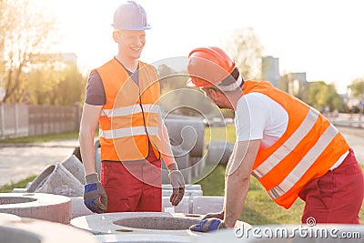 Labourers on road construction Stock Photo