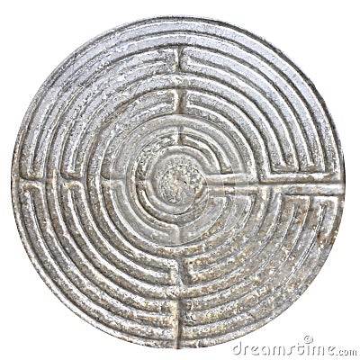 Labyrinth carved on the facade of a Romanesque church of the 11th century Stock Photo