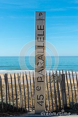 Lacanau, on the French Atlantic coast: 45th parallel marker Editorial Stock Photo