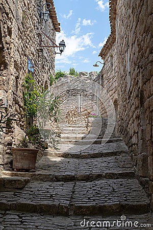 Lacoste Vaucluse Provence France ancient alley stairs in the old town Stock Photo