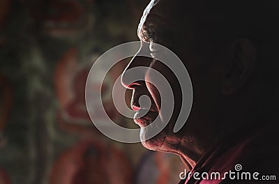 Ladakhi lama meditating with closed eyes Editorial Stock Photo