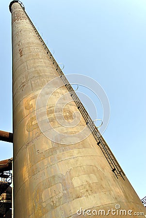Ladder to heaven, tall steel chimney steeping to the sky Stock Photo