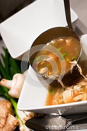 Ladle of soup Stock Photo