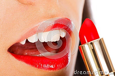 Lady applying Lip Gloss Stock Photo