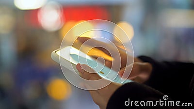 Lady chatting on smartphone with friend, writing message, internet connection Stock Photo