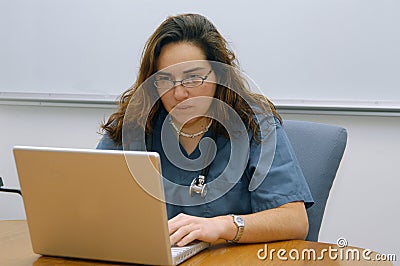 Lady doctor working in the notebook Stock Photo