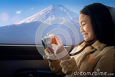 Lady and Fuji san on the train Stock Photo