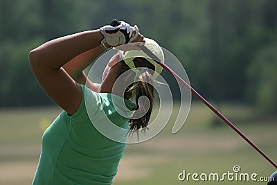 Lady golf swing Stock Photo