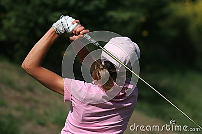 Lady golf swing Stock Photo