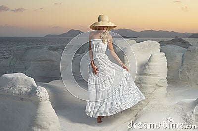 Lady in hat in an unusual landscape Stock Photo