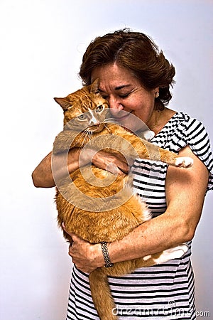 Lady holding cat Stock Photo