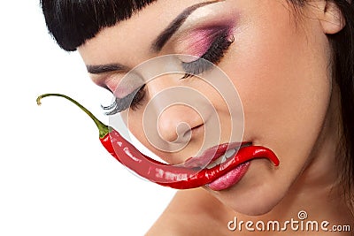 Lady holding red chilli peppers Stock Photo