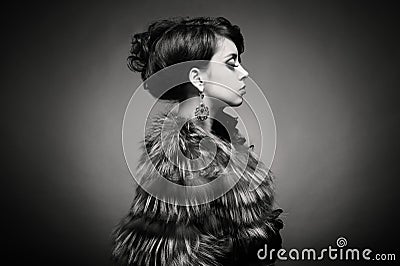 Lady in luxurious fur coat Stock Photo