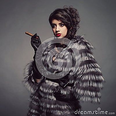Lady in luxurious fur coat Stock Photo
