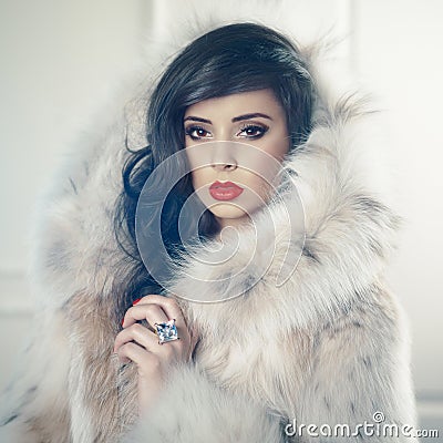 Lady in luxurious fur coat Stock Photo