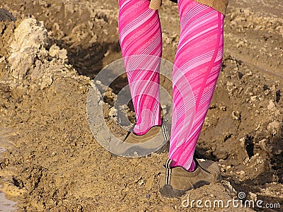 Lady in mud Stock Photo