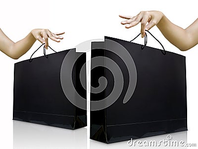 Lady pick up glossy black shopping bag Stock Photo