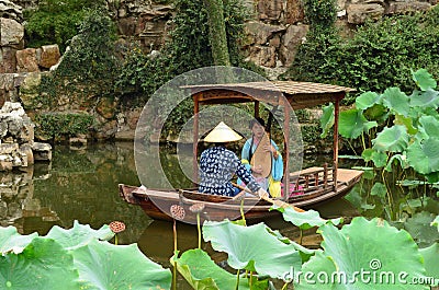 Lady Playing Lute on Small Boat, Lingering Garden, Suzhou, China Editorial Stock Photo