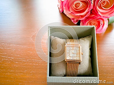 Lady`s gold rose watch in the luxury box Stock Photo