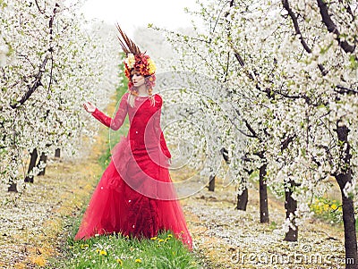 Lady Spring in the cherry orchard Stock Photo