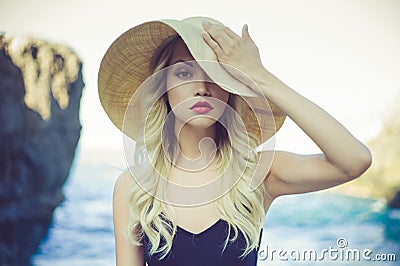 Lady in straw hat Stock Photo