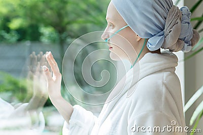 Lady touching glass Stock Photo