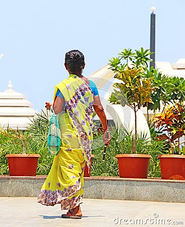 Lady walking with traditional costume india Editorial Stock Photo