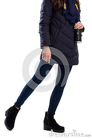 Lady wears navy down jacket. Stock Photo