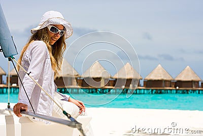 Lady on a white yacht Stock Photo
