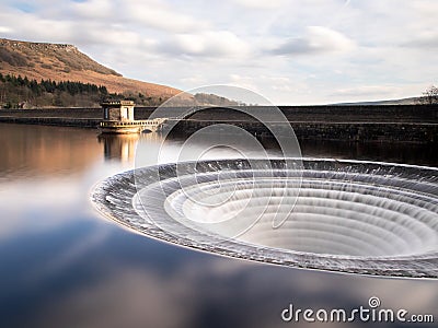 Ladybower reservoir bellmouth overflow plug hole and draw off tower Stock Photo