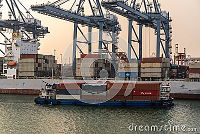 Small Lovegistics feeder container boat at Laem Chabang Thailand Editorial Stock Photo